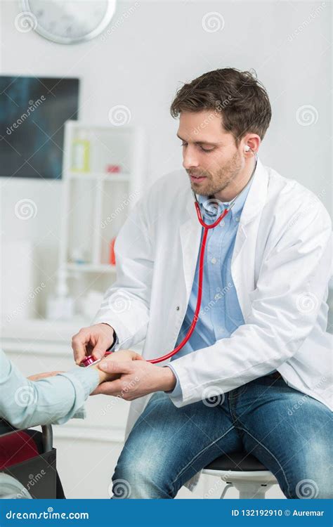 Doctor Ausculting With Stethoscope Stock Photo Image Of Doctor Male