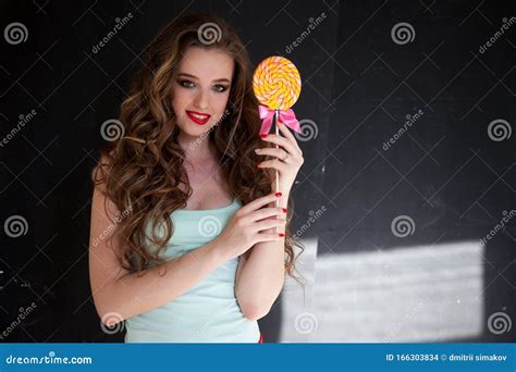 Beautiful Fashionable Woman Eats Candy Big Sweet Lollipop Stock Photo Image Of Eating Caramel