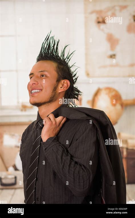 Close Up Of Happy Office Punk Worker Wearing A Suit With A Crest