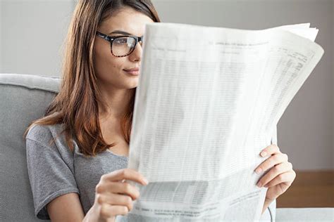 Woman Reading Newspaper Pics Stock Photos Pictures And Royalty Free