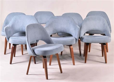 Eero saarinen dining chairs set of six knoll associates usa, 2014 oak, upholstery measures: Lot Detail - Eight Eero Saarinen Executive Dining Chairs