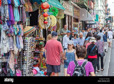 Pedestrians Walk In Chinatown New York City Stock Photo Alamy