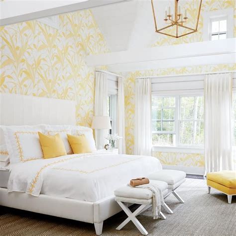 White And Yellow Bedroom Features A Vaulted Ceiling