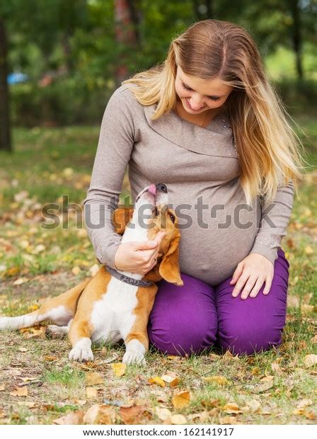 Happy Pregnant Woman Playing Her Pet Stock Photo 162141917 Shutterstock