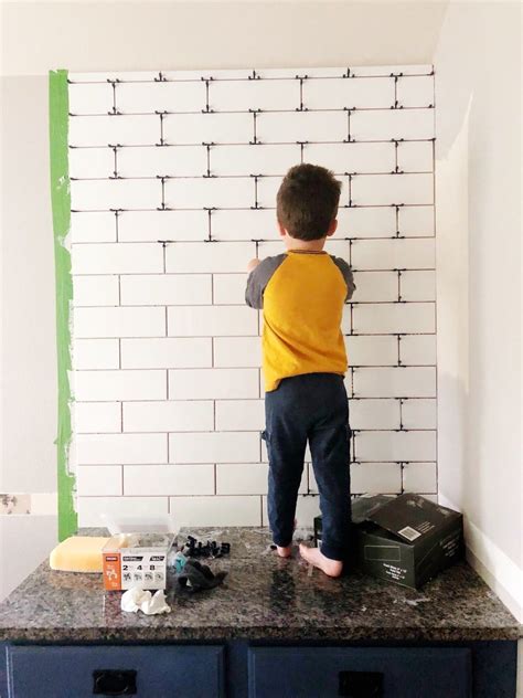 It took me about two days to complete, and cost less than $200. How to Install a Subway Tile Backsplash: Tips & Tricks