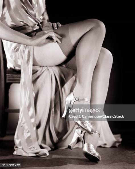Women Putting On Stockings Photos And Premium High Res Pictures Getty Images