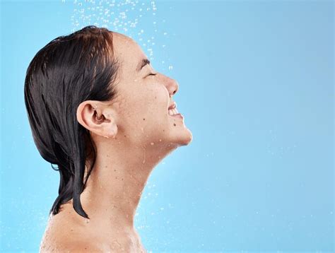 Premium Photo Asian Woman Shower And Water For Cleaning Smile And Happy In Blue Studio Mockup