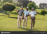 Men playing golf Stock Photo by ©ArturVerkhovetskiy 158194294