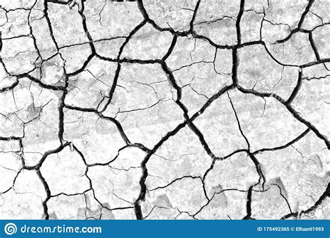 White Dried And Cracked Ground Earth Background Closeup Of Dry Fissure