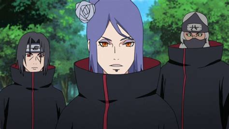 Three People In Black Hoodies With Orange Eyes And One Has Purple Hair