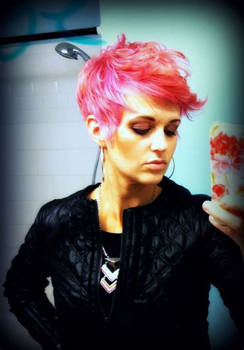 pink short hair longer pixie cut with the ability to wear it down or up in a fohawk pixie