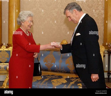 Britains Queen Elizabeth Ii Receives Lieutenant Colonel Anthony Davies