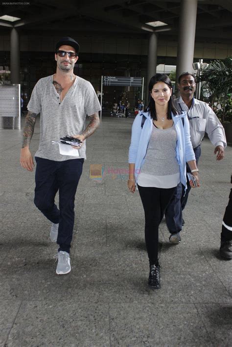 Sunny Leone With Husband Daniel Weber At The Airport On June