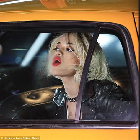 Rita Ora Gets A Soppy Kiss From A Dog As She Takes A Break From Dkny