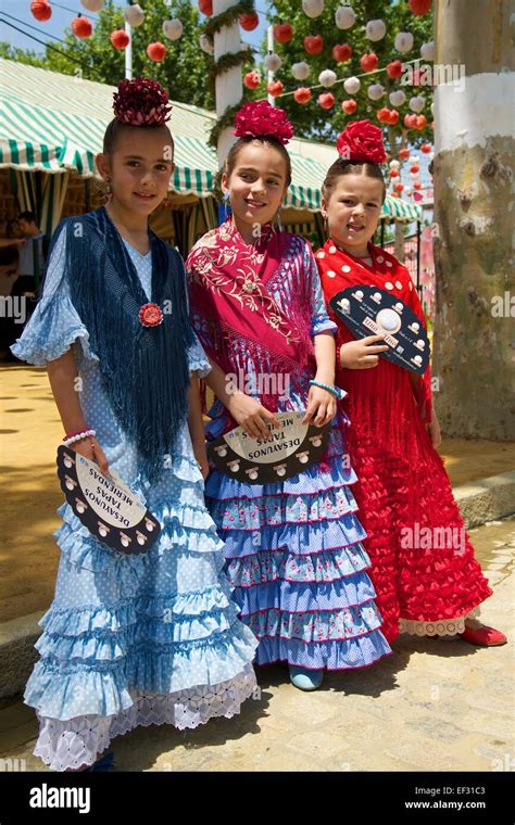 Girls Flamenco Dancers At The Feria De Abril Seville Andalucía