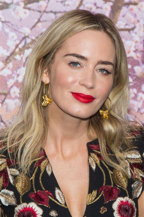 Emily blunt wears a brock collection suit, blouse, and tie. EMILY BLUNT at Mary Poppins Returns Gala Screening in ...