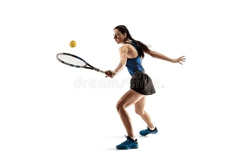 Full Length Portrait Of Young Woman Playing Tennis Isolated On White