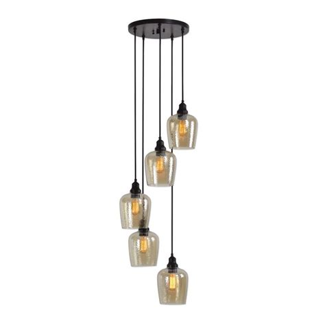 three glass pendant lights hanging from a black metal ceiling fixture with five bulbs on each end