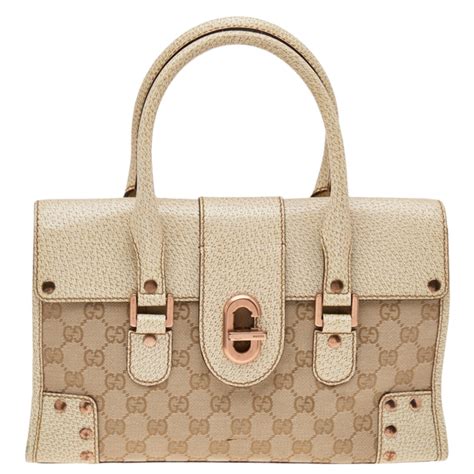 Gucci Bags Gucci Beigecream Gg Canvas And Leather Turnlock Shoulder