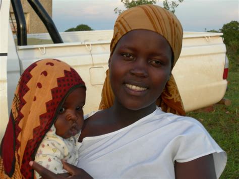 Mãe africana com bebê Download gratuito de fotos FreeImages