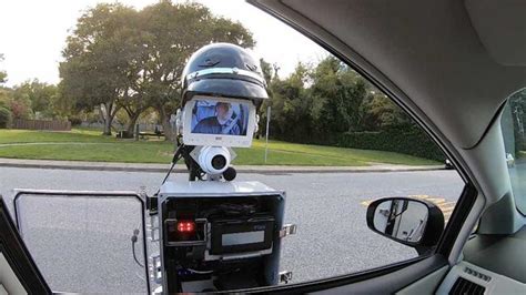 The Future Is Here Watch Robot Cop Pull Over Driver And Issue Ticket