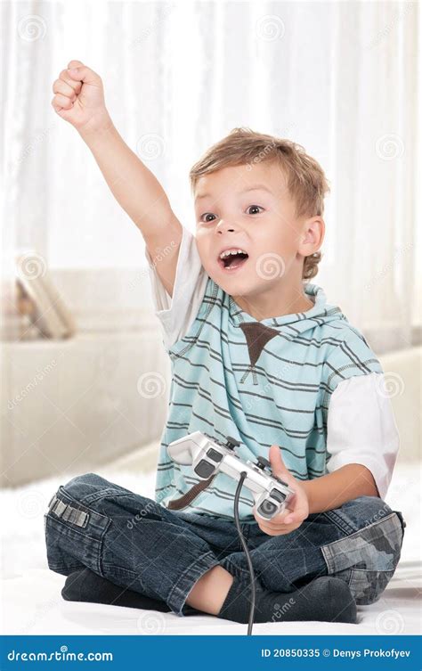 Happy Child Playing A Video Game Stock Image Image Of Electronic