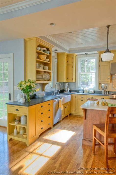 The kitchen is the center of your home, so give it the chance to shine bright with the color yellow. Country Kitchen Design Pictures and Decorating Ideas ...