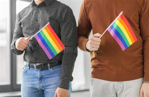 close up of male couple with gay pride flags stock image image of masculine freedom 121224351