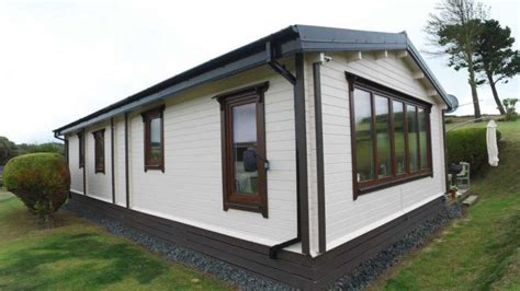 Time To Upgrade With A New Loghouse Mobile Home Log Cabin