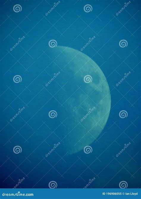 A Blue Blue Moon Or Half Moon Stock Image Image Of Turquoise Blue