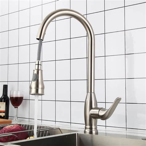 Spray features a toggle button to switch between aerated and jet spray and is held in place with a counter weighted magnet. Stainless steel kitchen faucet with pull-out spray-Kitchen ...