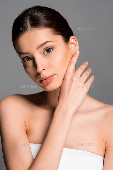 Attractive Naked Woman With Perfect Skin Isolated On Grey Stock Photo By Lightfieldstudios