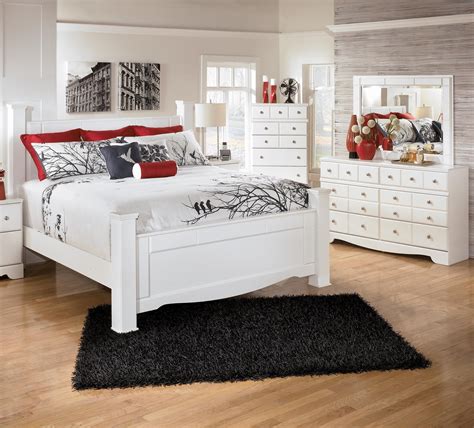 Antique white finish over replicated oak grain. Signature Design by Ashley Weeki 3 Piece Queen Bedroom ...