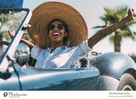 Black Woman Driving A Vintage Convertible Car A Royalty Free Stock