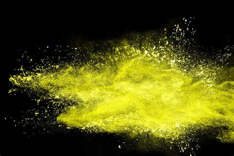 Abstract Yellow Dust Explosion On Black Background Stock Image Image