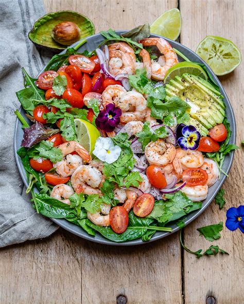 Meanwhile, in a medium bowl, mix together the corn, tomatoes, red and green onions, pepper and beans. Shrimp And Avocado Salad With Cilantro And Lime - Recipe Video