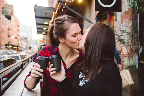 An Attractive Young Lesbian Couple On A Date Downtown By Stocksy