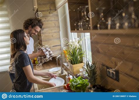 Couple Washing The Dishes Together Stock Image Image Of Dishes