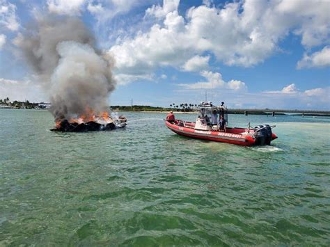 Coast Guard Responds To Boat Fire Capsized Vessel