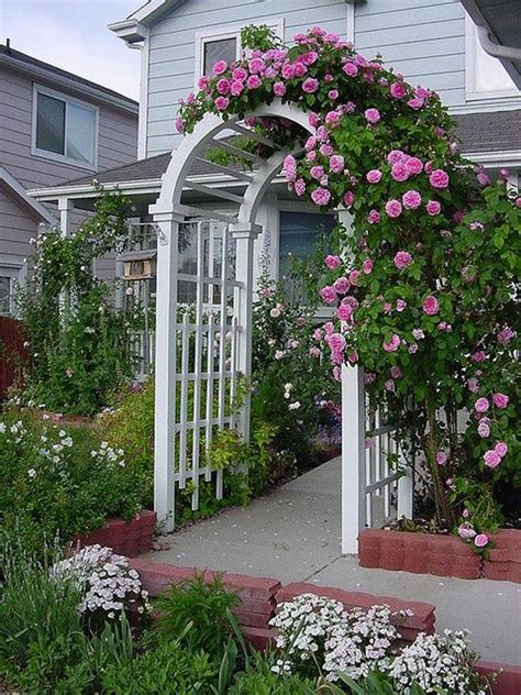 10 gorgeous garden gates you'll want to copy. rose-arbor-white-garden-gate-with-small-pathway | HomeMydesign