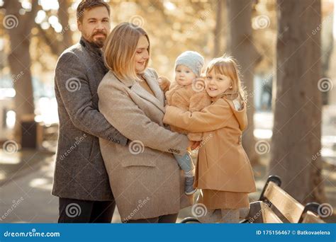Husband And Wife With Two Children Stock Image Image Of Girl Holding