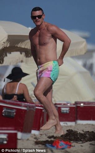 Luke Evans Shows Off His Nipple Piercings On Holiday In Miami Beach Daily Mail Online