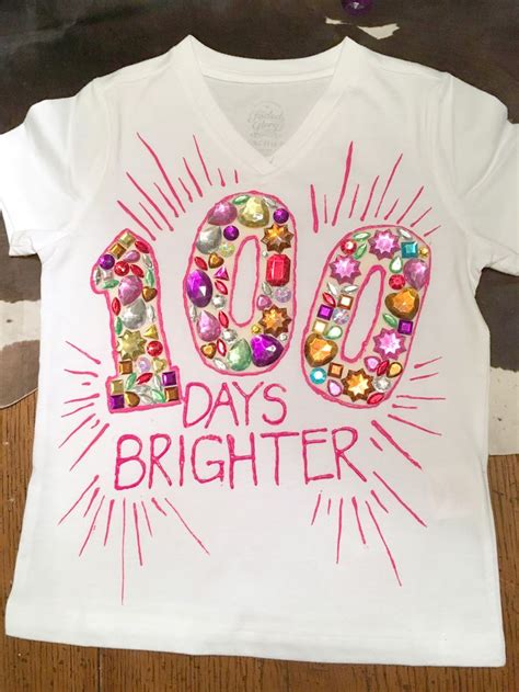a white shirt with the words 100 days brighter on it