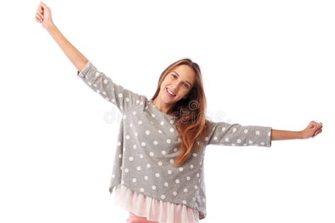 Confident Smiling Girl Spreading Arms Wearing Trendy Dotted Pullover