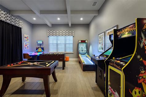 with both old school and new arcade games skee ball® bumper pool and foosball this game room