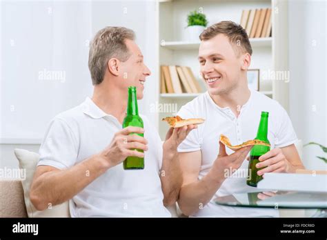 Father And His Adult Son Drinking Beer Stock Photo Alamy