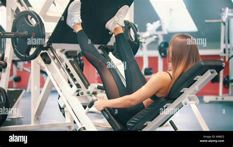 Woman Hard Leg Press Exercise Hi Res Stock Photography And Images Alamy
