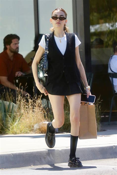 Madison Beer Puts On A Leggy Display In A Black Mini Skirt While Out On A Shopping Trip In West