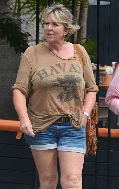 Fern Britton Flashes Bra In See Through Top And Tiny Denim Shorts