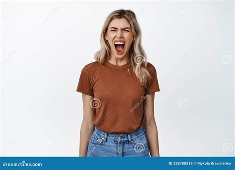 Angry Blond Woman Screaming With Frustration Girl Shouting At Camera